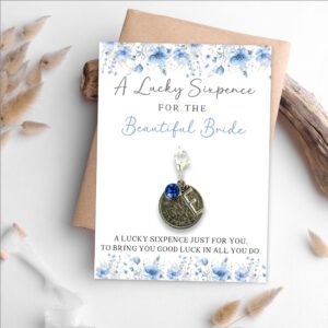 lucky sixpence charm for bride on a blue floral card